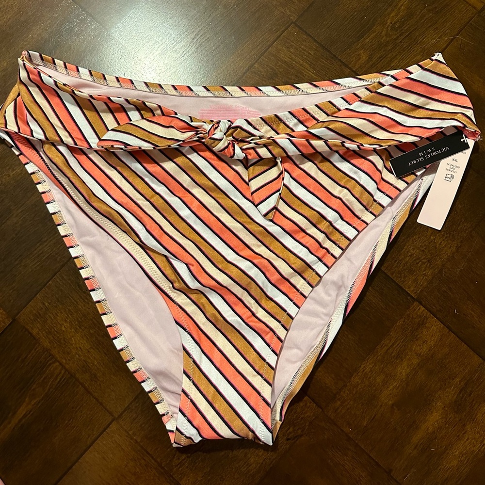 Victoria’s Secret pink white and brown striped swim bottoms with bow detail. NWT